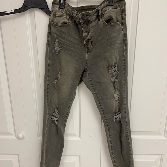grey button fly jeans